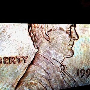 Coin Lincoln Penny Finish error. Rainbow 1991 Penny.
